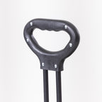 Close-up of the black ergonomic pull handle on the beach trolley.