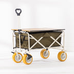 Green folding trolley with cream frame, yellow all-terrain wheels, pull handle and slatted tabletop fitted on top.