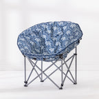 A round moon lounge chair with a blue and white palm tree pattern fabric cushion on a silver metal folding frame, set against a clean white studio background.