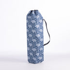 A blue drawstring moon chair bag with a white palm tree pattern, standing upright on a white studio background.