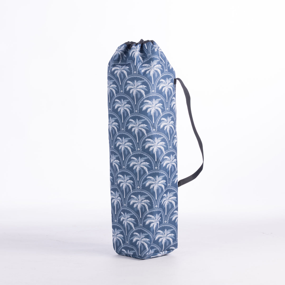 A blue drawstring moon chair bag with a white palm tree pattern, standing upright on a white studio background.