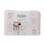 Hush brand sheet set packaging with floral design on a white background