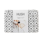 Hush brand flat sheet packaging with floral pattern on a white background