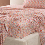 Close-up of the Marlo Mia Floral fitted sheet showcasing the delicate multicoloured floral print and smooth cotton sateen finish.