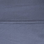 Close-up of dark blue fabric with a visible seam