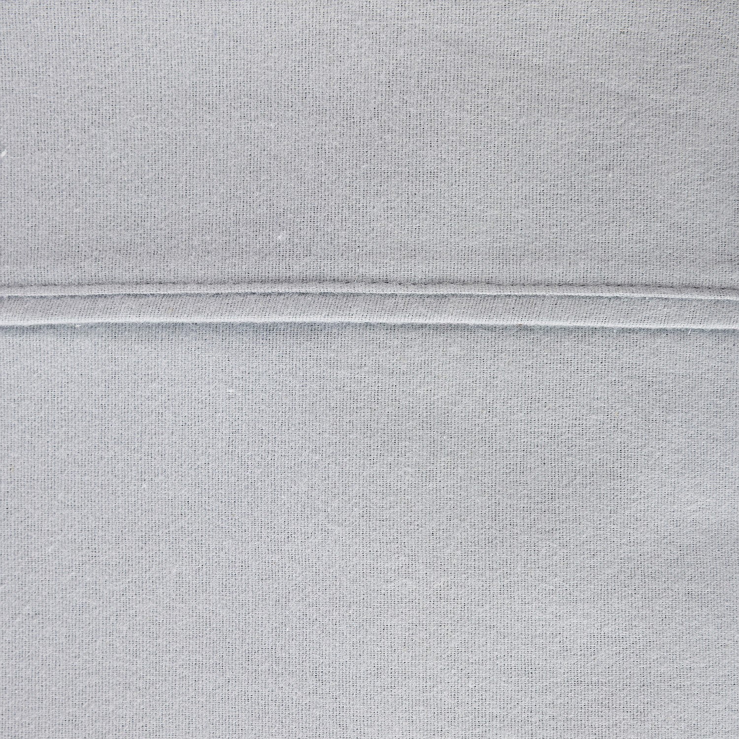 Close-up of gray fabric with a subtle pattern