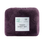 Purple teddy sheet set with a label on a white background