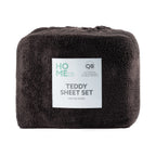 Dark brown teddy sheet set with a label on a white background