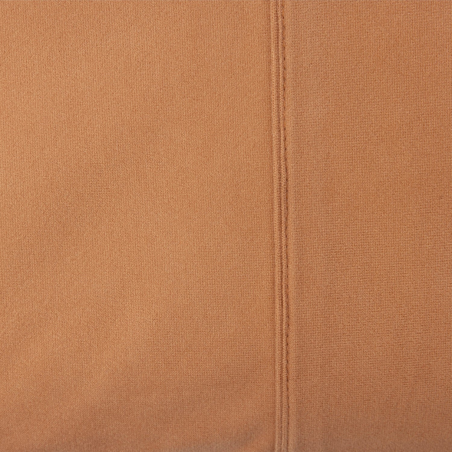 Close-up of brown fabric with a seam running vertically.