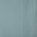 Close-up of a light blue fabric with a seam