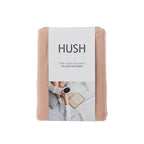 Folded pink flannel fabric with 'Hush' packaging on a white background