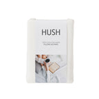 Pack of Hush pillowcases with a person holding a cup and book on a white background
