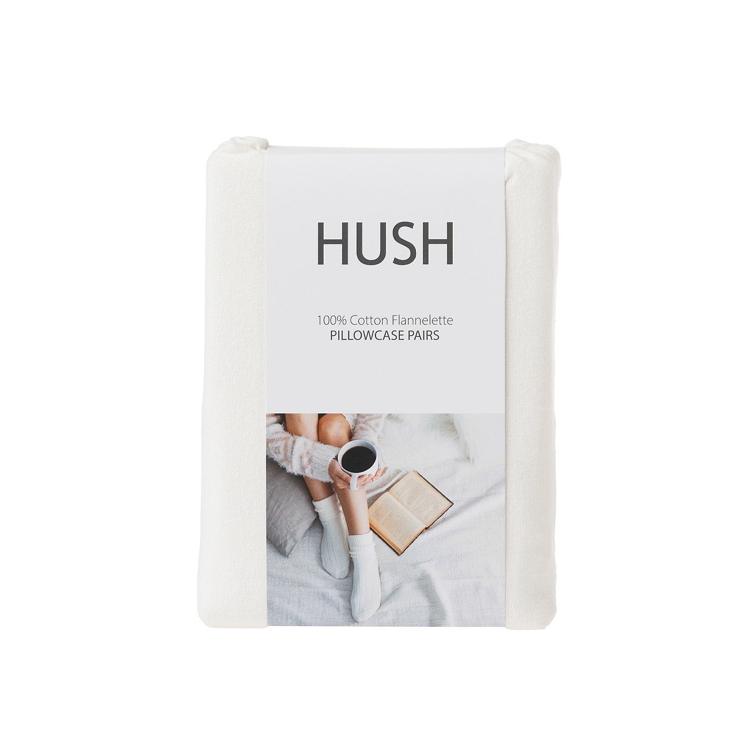 Pack of Hush pillowcases with a person holding a cup and book on a white background