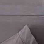 Close-up of gray fabric with a subtle pattern