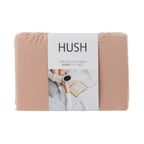 Packaged Hush queen flat sheet with a white label on a white background