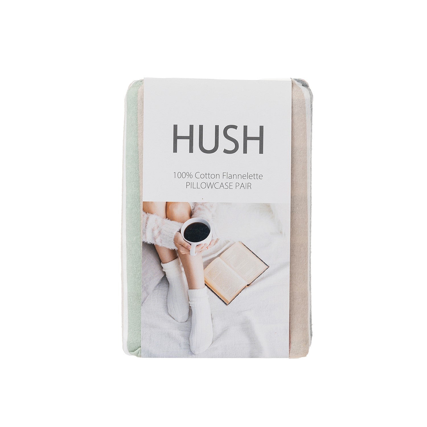 Pack of Hush pillowcases with a person holding a cup and book on a white background