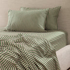 Marlo Mia Stripe Flat Sheet styled with matching striped pillowcases, highlighting the coordinated pink and green stripe design.