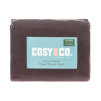 A neatly packaged polar fleece fitted sheet set in a berry tone showcases its ultra-soft texture, offering cosy comfort for cooler nights.